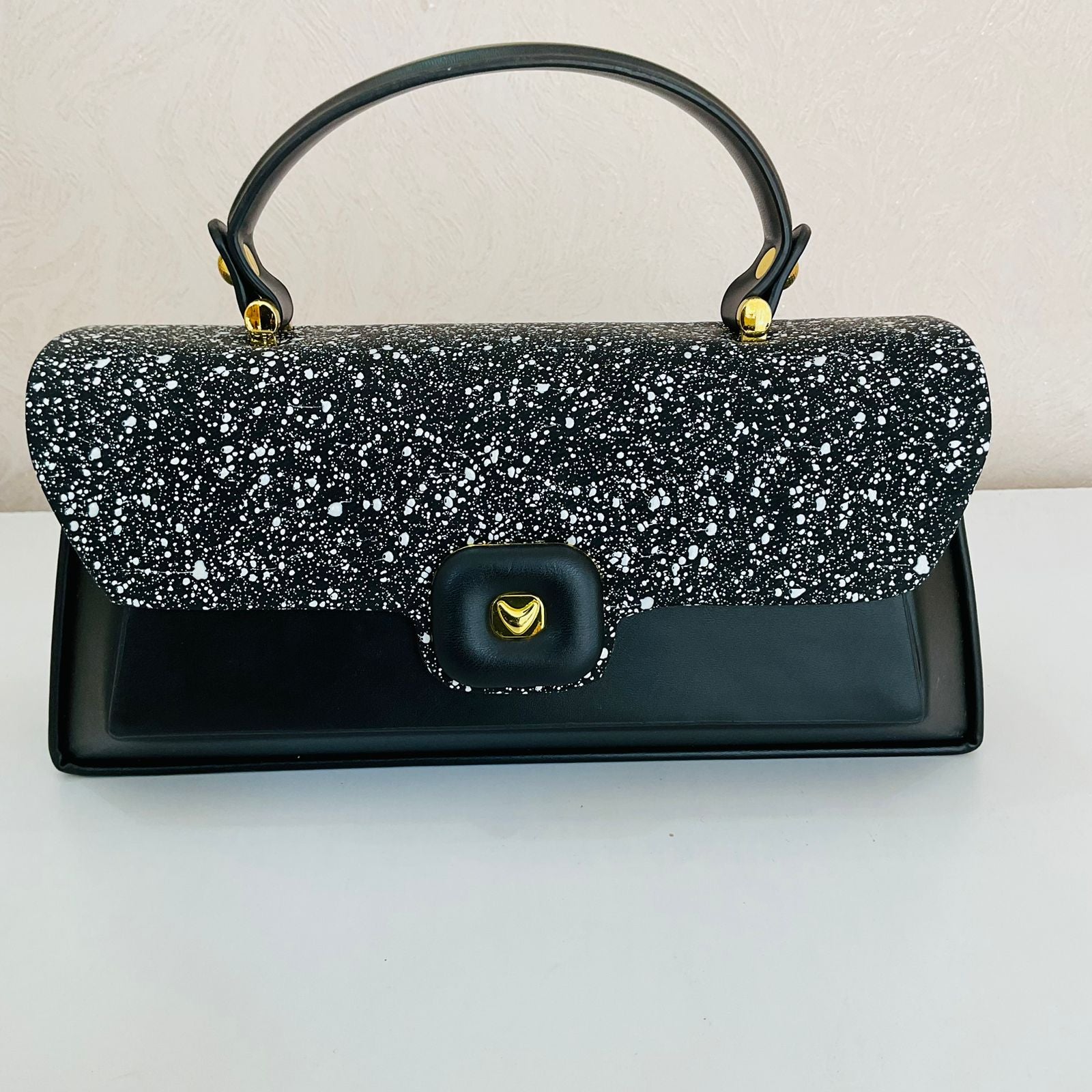 BLACK PEARCHED-LEATHER BAG