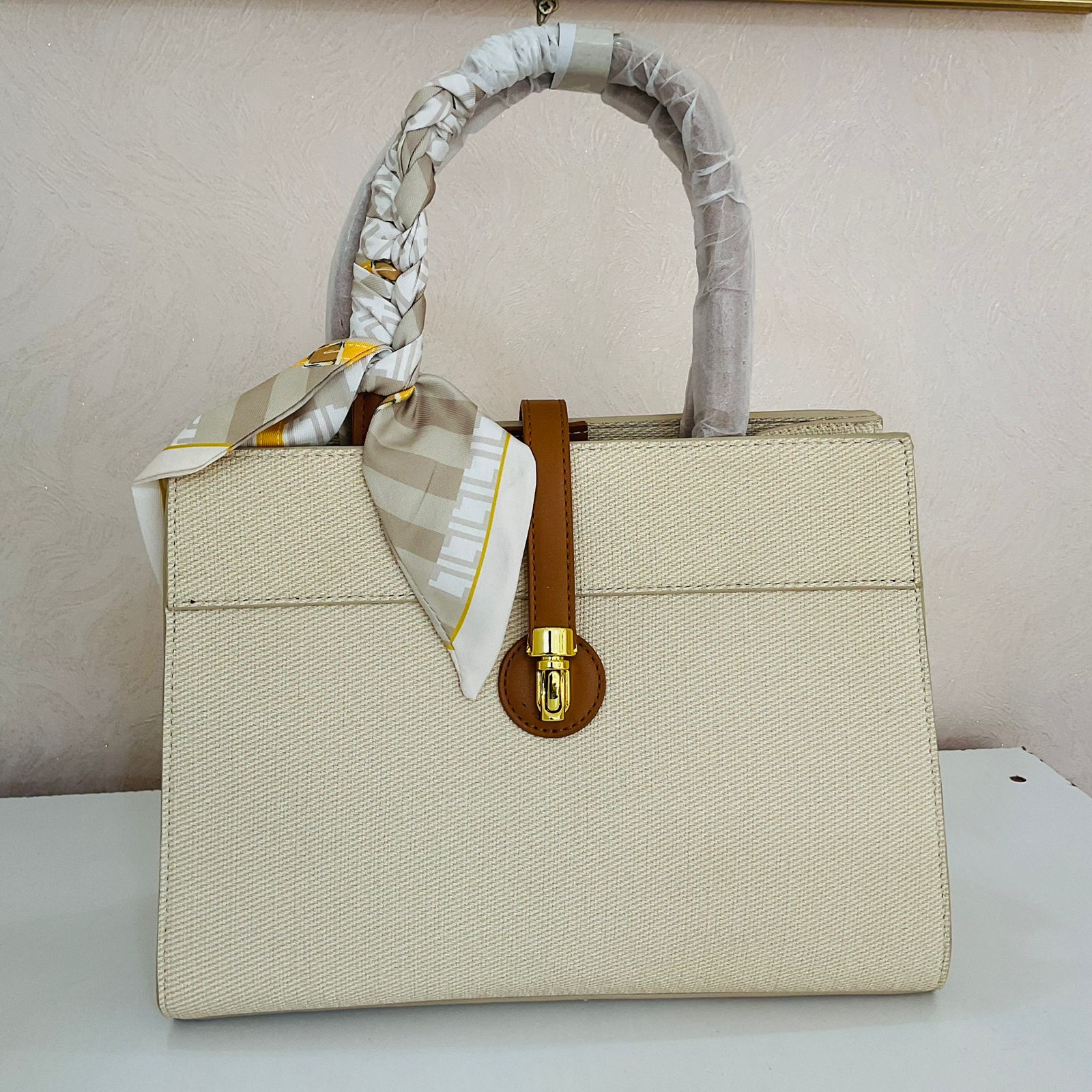 CREAM SCALFED BAG
