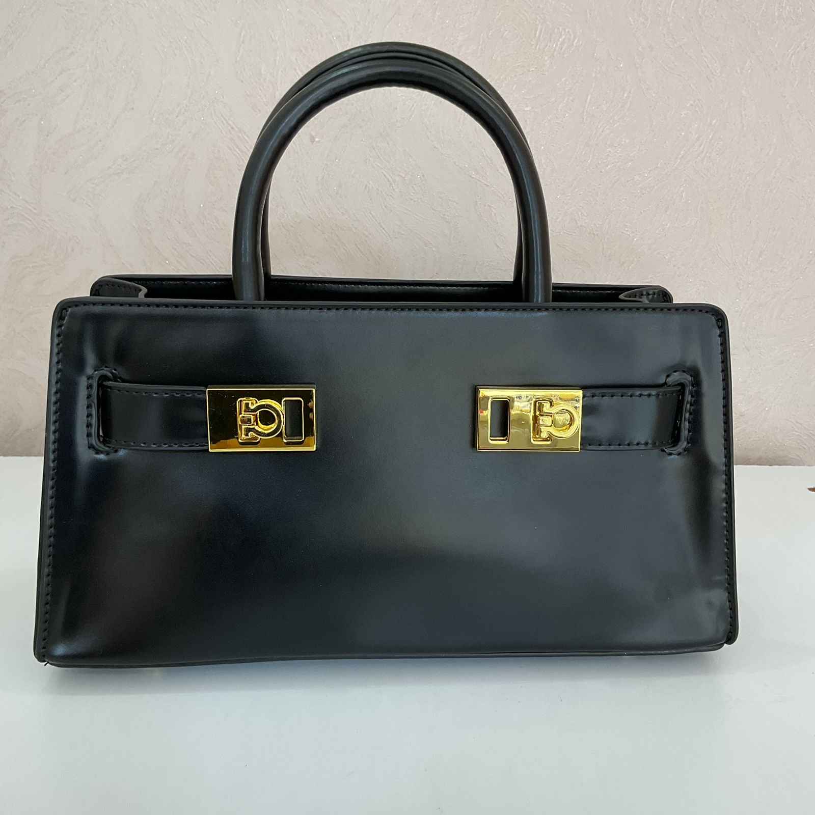 BLACK LEATHER BAG- GOLD HANDLES